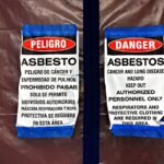 bilingual asbestos warning signs on plastic covering a front door